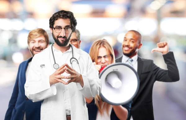 Jovem médico engraçado planejando algo — Fotografia de Stock