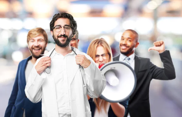 Young funny doctor in success pose — Stock Photo, Image