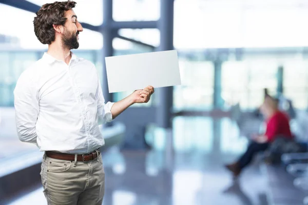 Joven divertido hombre con pancarta — Foto de Stock