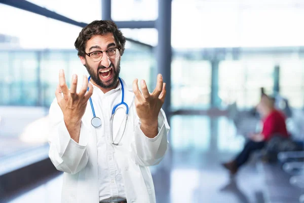 Νεαρός γιατρός αστείο σε ηττημένος πόζα — Φωτογραφία Αρχείου