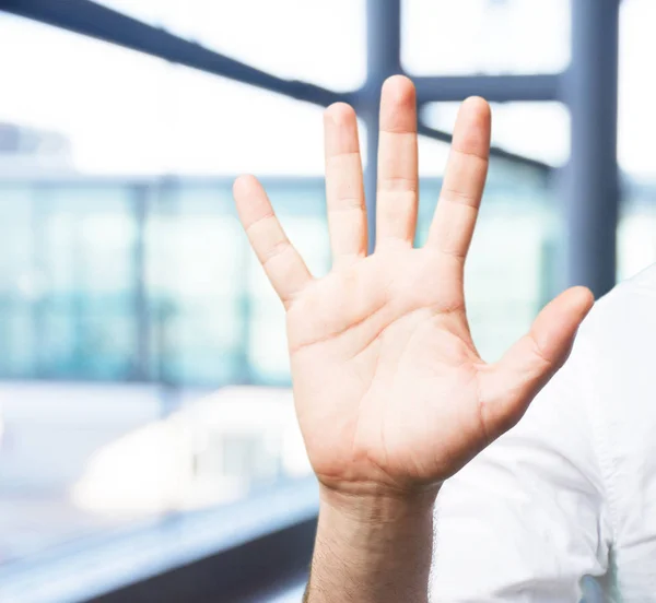 Jonge man hand met stopbord — Stockfoto