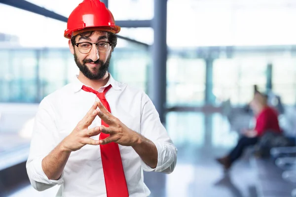 Jovem arquiteto engraçado planejando algo — Fotografia de Stock