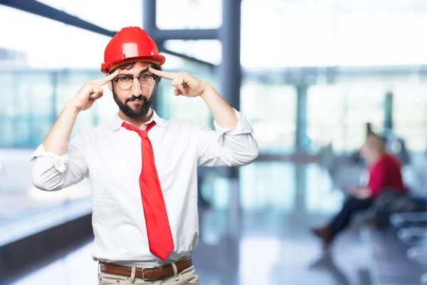 Funny architect thinking with worried expression — Stock Photo, Image