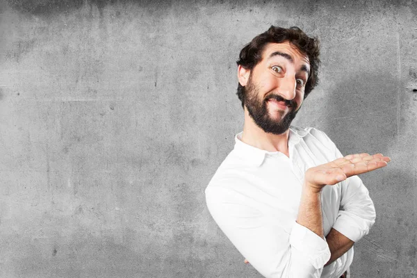 Junger lustiger Mann zeigt Geste — Stockfoto