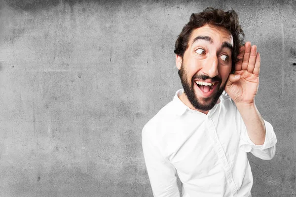 Grappige jongeman luisteren — Stockfoto