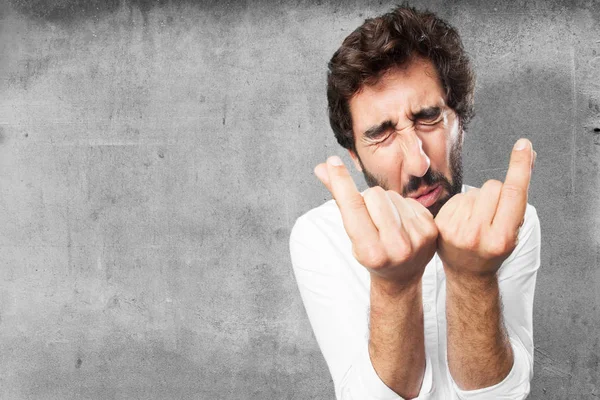 Hombre con signo de dinero y expresión triste —  Fotos de Stock