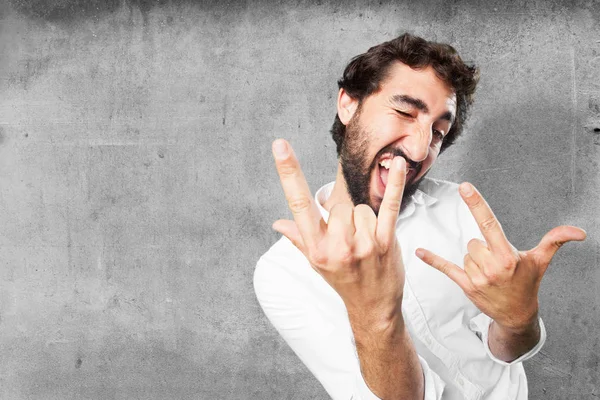 Young funny man in disagreement pose — Stock Photo, Image