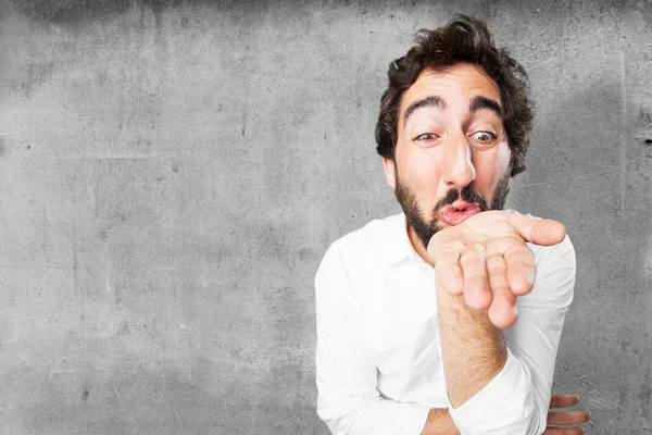 Young funny man with air kiss — Stock Photo, Image