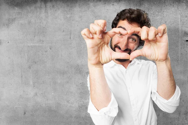 Young funny man with heart sign — Stock Photo, Image