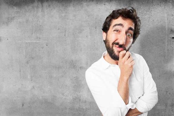 Man in confused pose with worried expression — Stock Photo, Image