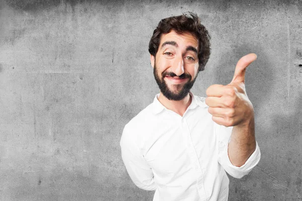 Joven divertido hombre con signo de bien — Foto de Stock