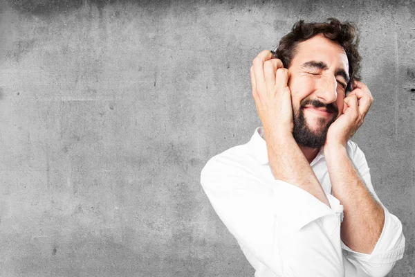 Joven divertido hombre con auriculares —  Fotos de Stock