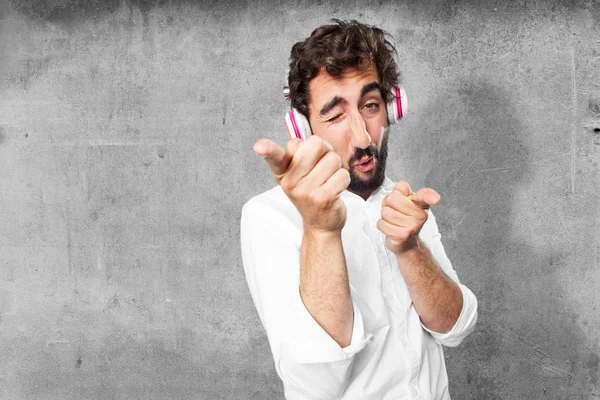 Jovem engraçado homem com fones de ouvido — Fotografia de Stock