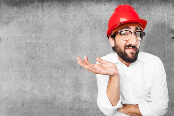 Funny architect thinking with worried expression — Stock Photo, Image