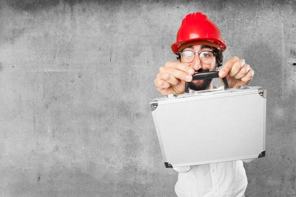 Young funny man with a case — Stock Photo, Image