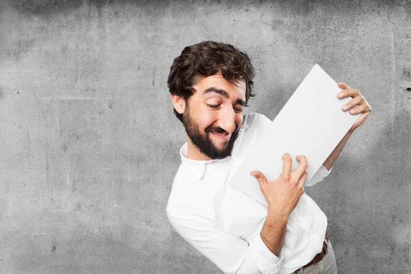 Young funny man with a placard — Stock Photo, Image