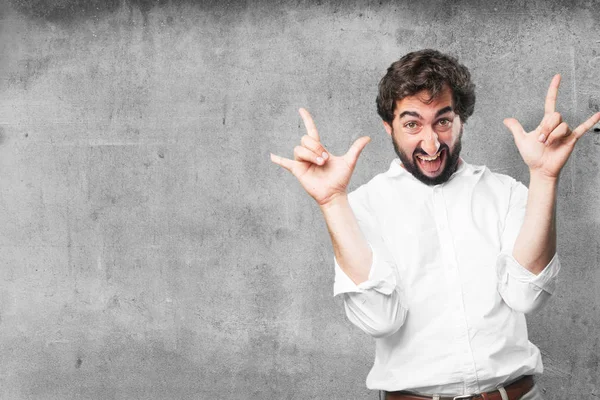 Man with rock gesture and disagree expression — Stock Photo, Image