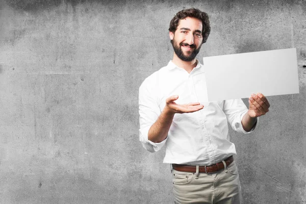 Young funny man with placard — Stock Photo, Image