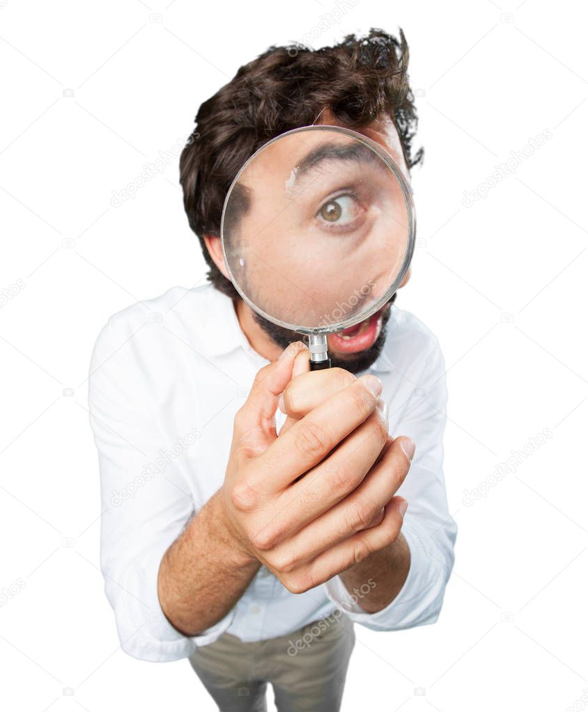 man with magnifying glass and surprise expression