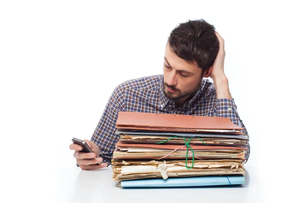 Young angry businessman with files — Stock Photo, Image