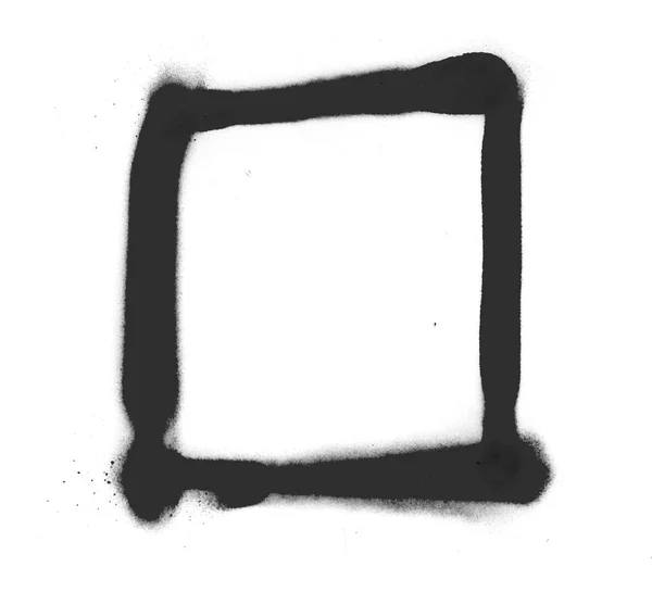 Σπρέι μαύρο σύμβολο ενάντια σε λευκό φόντο — Φωτογραφία Αρχείου