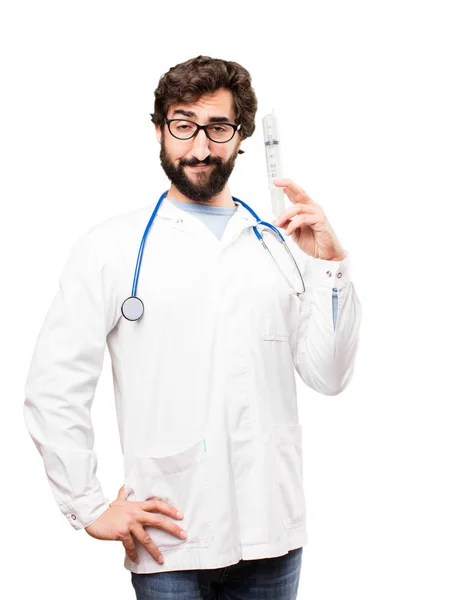 Молодой врач со шприцем — стоковое фото