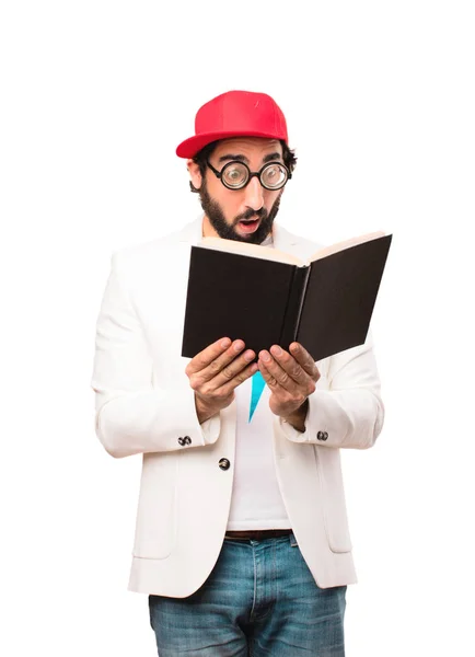 Joven empresario loco con un libro — Foto de Stock