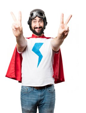 zafer işareti ile genç süper kahraman