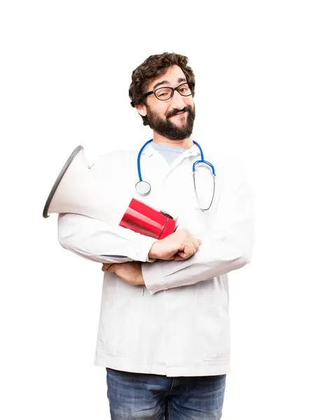 Joven doctor hombre con un megáfono —  Fotos de Stock