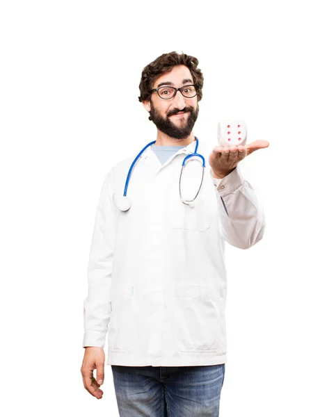 Genç doktor adam bir zar ile — Stok fotoğraf
