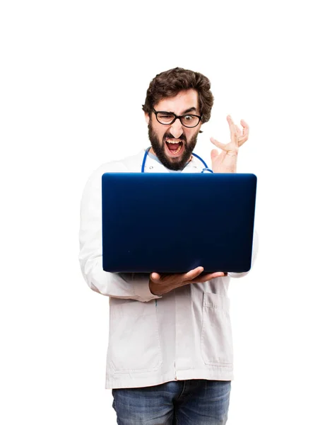 Young doctor man with a laptop — Stock Photo, Image
