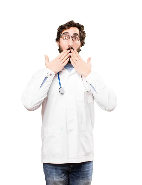 Молодий лікар чоловік покриває рот — стокове фото