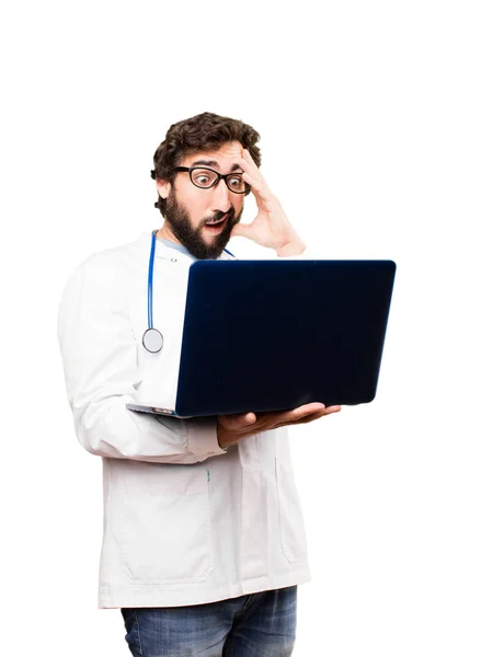 Young doctor man with a laptop — Stock Photo, Image