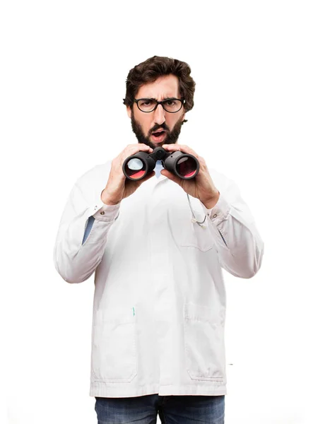 Junger Arzt mit Fernglas — Stockfoto