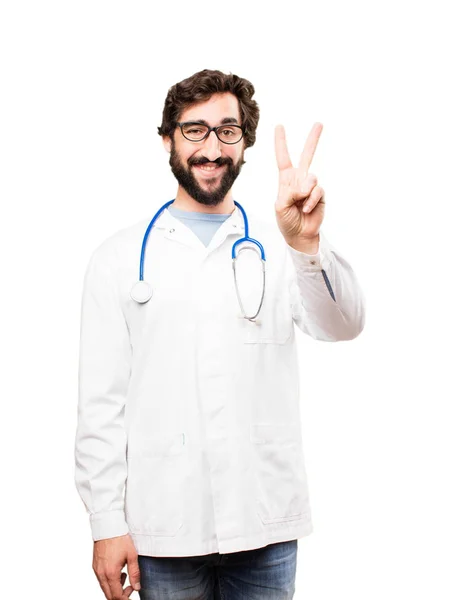 Joven doctor hombre con signo de número —  Fotos de Stock