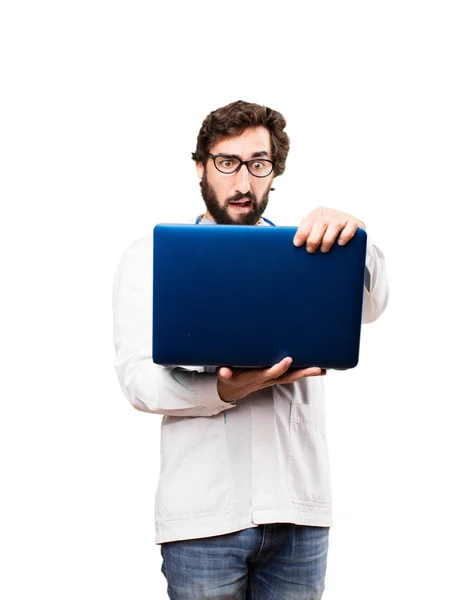 Człowiek młody lekarz z laptopem — Zdjęcie stockowe
