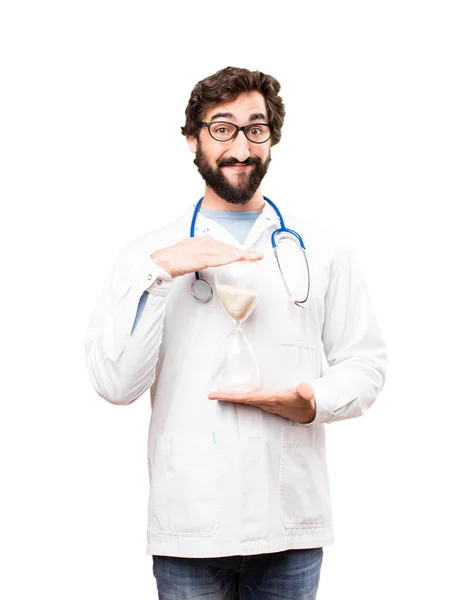 Jeune médecin homme avec une horloge de sable — Photo