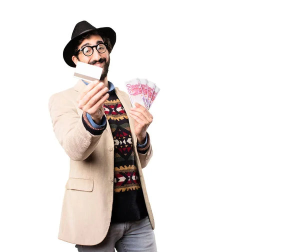 Cool hipster with a credit card and banknotes — Stock Photo, Image