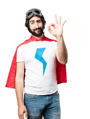 Tamam işareti ile genç süper kahraman