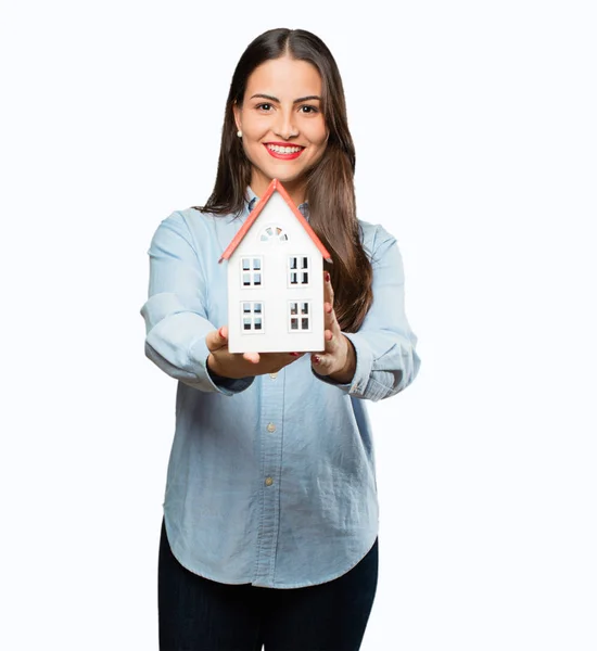 Giovane ragazza cool con una casa — Foto Stock