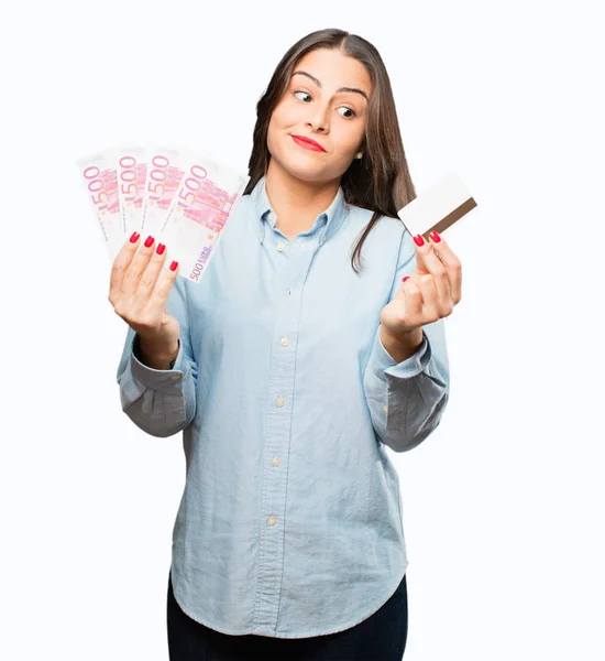 Cool girl with credit card and banknotes — Stock Photo, Image