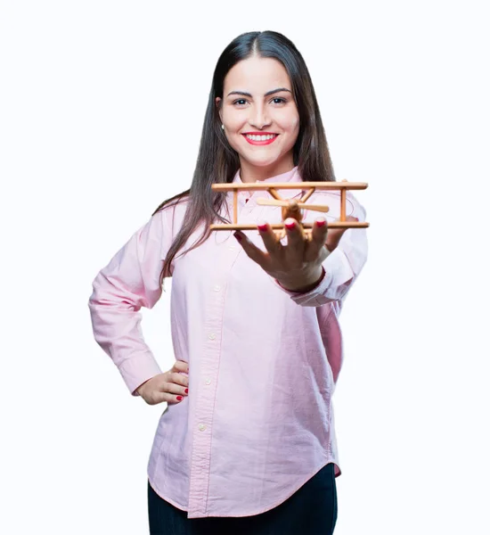 Young cool girl with a wooden plane — Stock Photo, Image