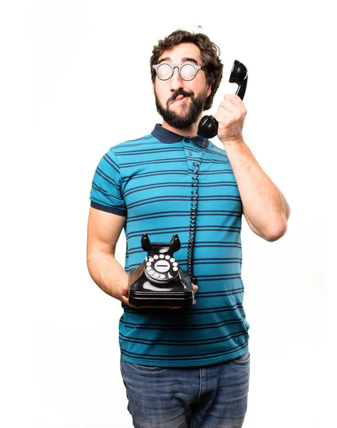 Joven hombre fresco con un teléfono vintage — Foto de Stock