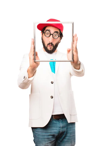 Young crazy businessman with a frame — Stock Photo, Image