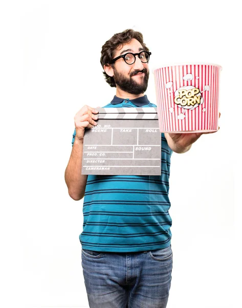 Cool man med en kläpp och popcorn — Stockfoto
