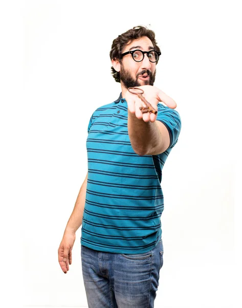 Young cool man with old key — Stock Photo, Image