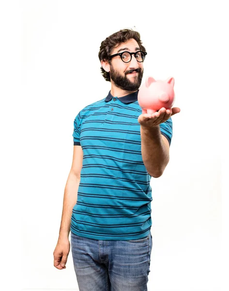 Young cool man with a piggy bank — Stock Photo, Image