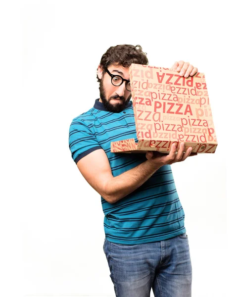 Leuke jongeman met een pizza — Stockfoto