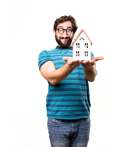 Young cool man with a house — Stock Photo, Image