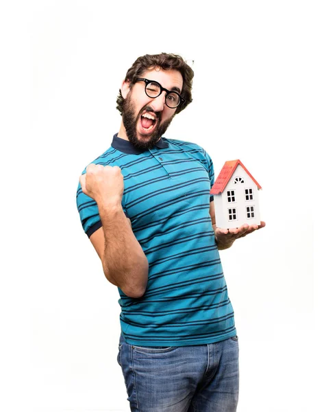 Young cool man with a house — Stock Photo, Image